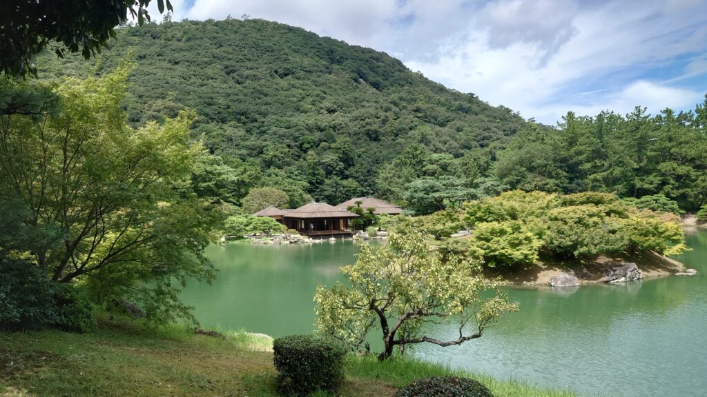菅野　利光
